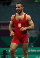 muscled-fighter-spandex-singlet-bulge-.jpg