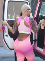 Amber-Rose-in-Pink-Spandex-Body-Suit--09-662x883.jpg