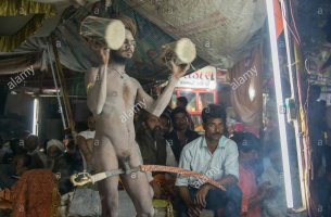 naga-sadhu-with-penis-around-sword-shivratri-bhavnath-mela-EGFKC1.jpg